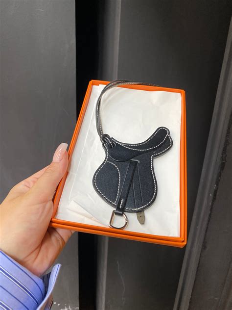 hermes saddle charm|hermes saddle with wings.